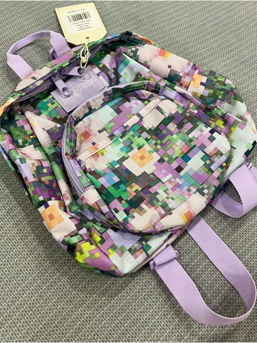 Jansport Pixel Print Mini Backpack in Lavender and Multi